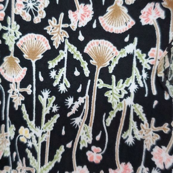 Adorable BCBG knit romper. So comfortable.Delicate pattern. Sheer ruffle… - Picture 4 of 7